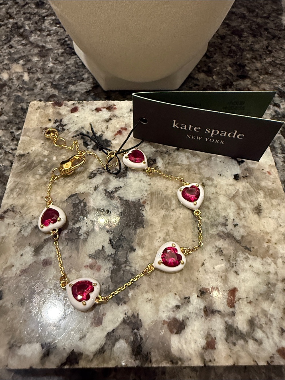 kate spade Gold-Tone Bracelet with White Heart Accents and Pink Stones